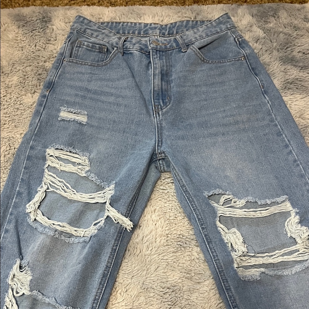 Distressed Light Blue Jeans